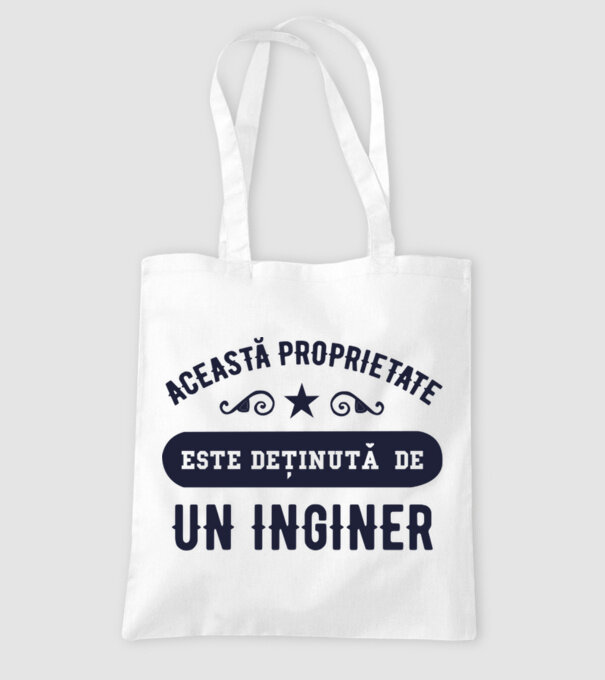 Această proprietate este deținută de un inginer model alb pe tricou