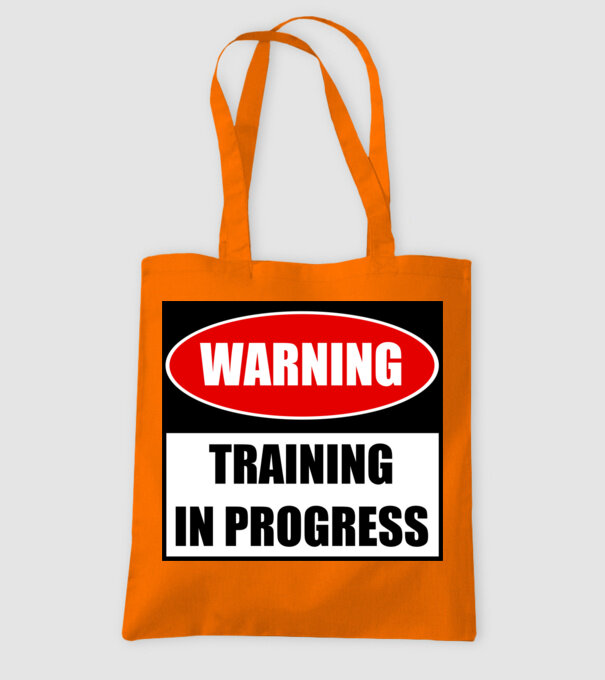 Warning Training In Progress model portocaliu pe tricou