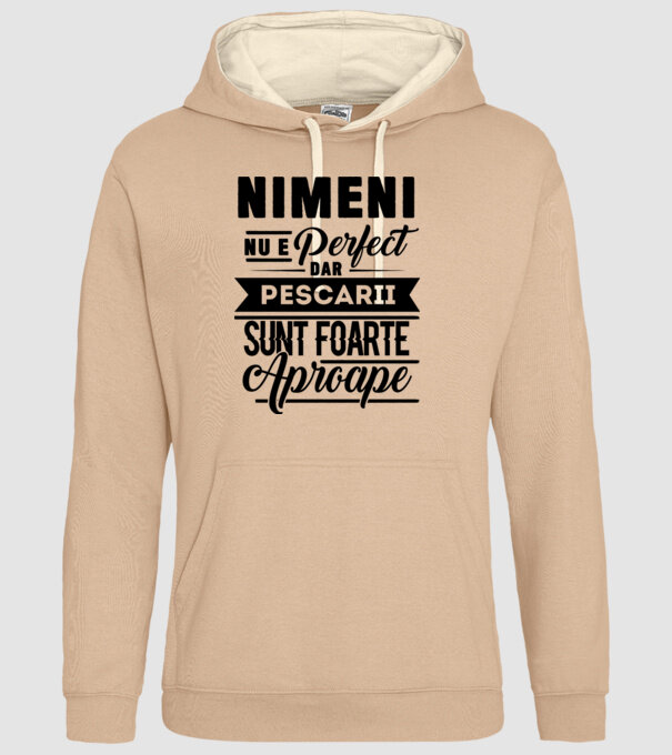 Nimeni nu e perfect, dar pescarii sunt foarte aproape model nisipiu pe tricou