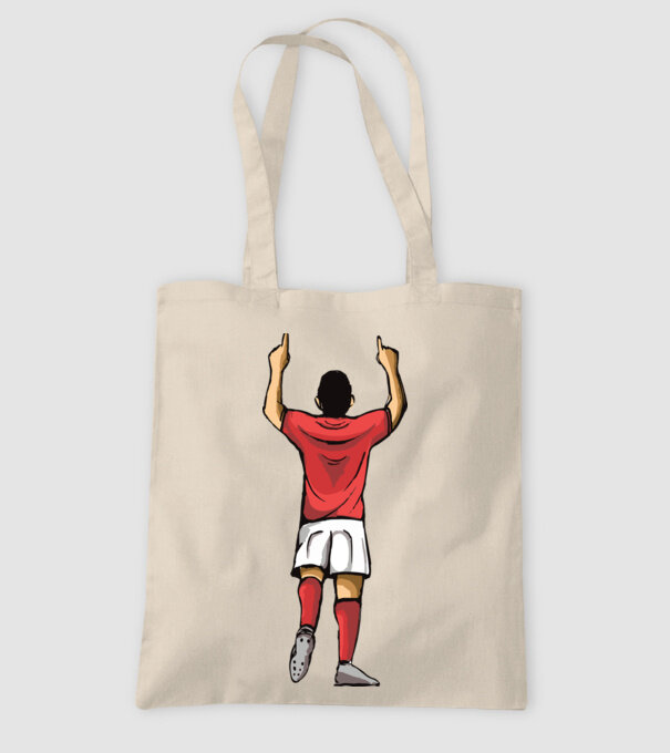 Fotbalist sărbătorind golul model nisipiu pe tricou