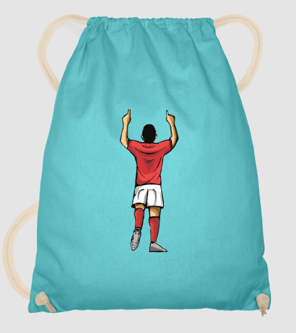 Fotbalist sărbătorind golul model turcoaz pe tricou